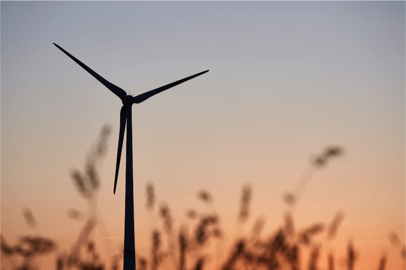 Wind turbine at sunset